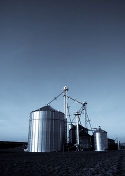 Modern farmer silos factory in open fields