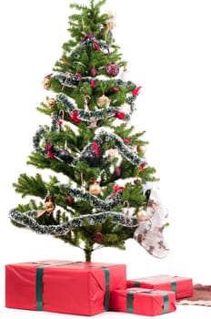 Christmas tree with presents isolated on white