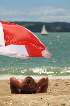 woman relaxing on a hot tropical beach