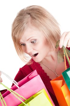 Beautiful woman with shopping bags isolated onwhite