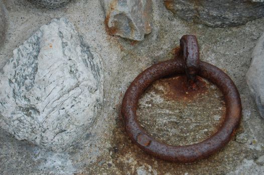 mooring ring and stone