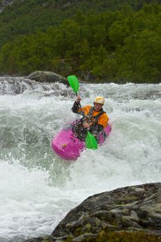 Kayak trip on the waterfalls in Norway. July 2010