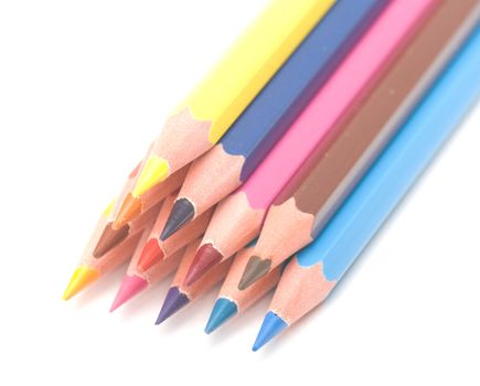 Set of colour pencils on a white background. Close up