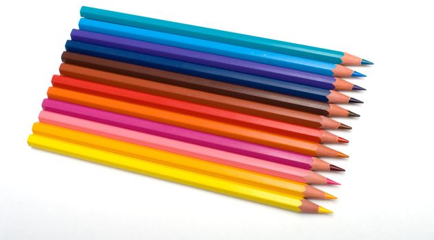 Set of colour pencils on a white background