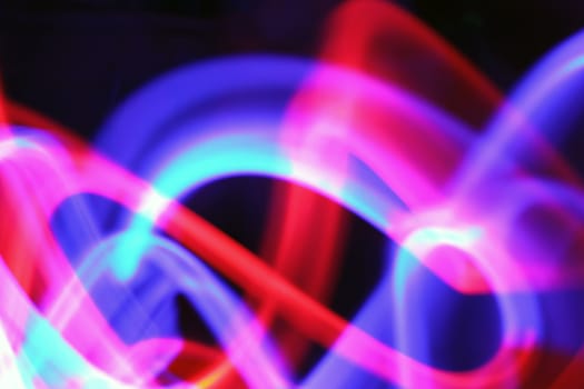 abstract light painting with blue red pink and over colors
