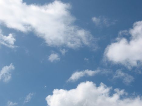 A beautiful bright sunny day in the Caribbean, with soft white clouds moving by.