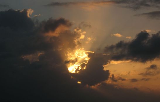While the sun was approaching the sunset, a storm was forming and moving closer. This was in the Caribbean.