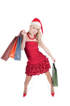 Happy woman with Christmas presents isolated on white