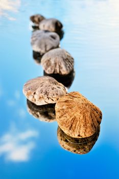 Reflexion of sea stones and the sky