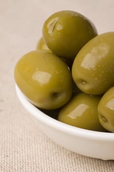 bowl full of green greek olives - healthy eating