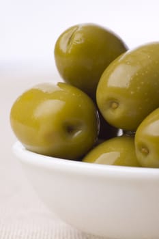 bowl full of green greek olives - healthy eating
