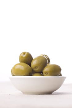 bowl full of green greek olives - healthy eating