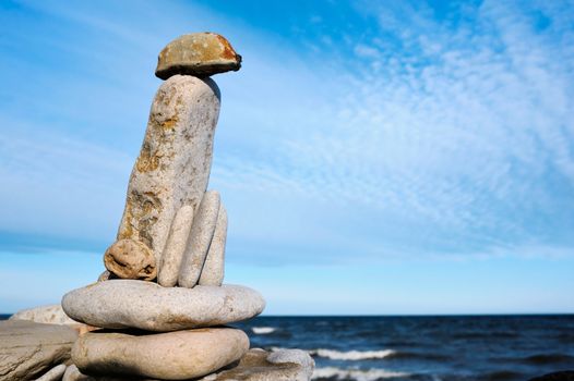 Towering stone from a group of gravel