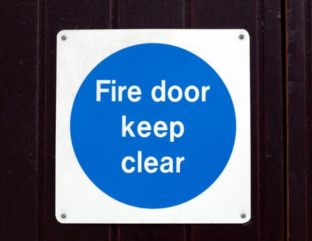 Detail of Fire door keep clear sign