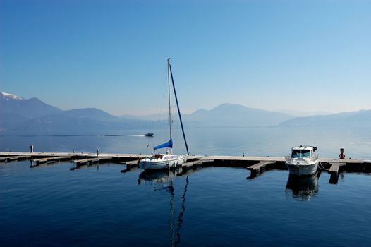 Two boats docked in Lake Maggiore Italy