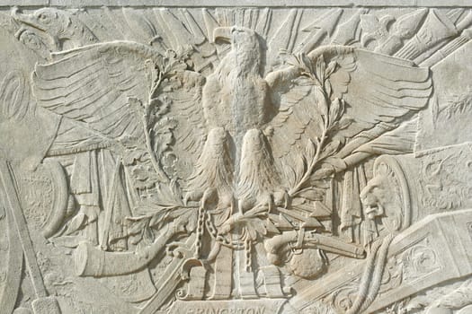 A carved eagle in cement