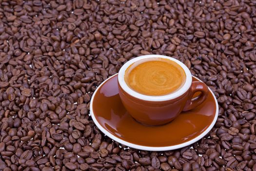 espresso cup and coffee beans on white background