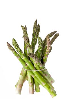 detail of fresh green asparagus isolated on white background