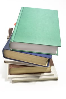 Pile of books, taken picture close up on a white background