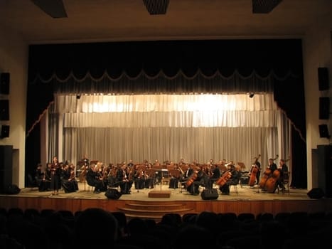 Symphonic orchestra, concerto, symphony, music instruments, people, troupe, scene, appearance, musician, sound, curtain