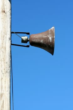 A Loudspeaker against blue sky  
