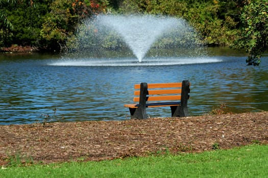Park bench overlooking a fountain
