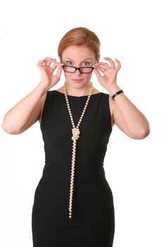Surprised woman in glasses in black dress