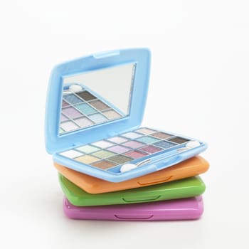 Coloured eyeshadows kit with mirror