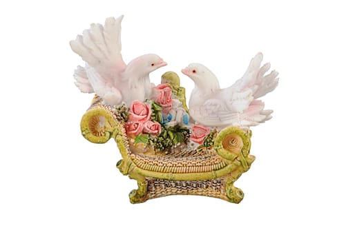 statuette of steam of cooing white pigeons with clipping paths