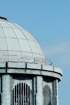 A Building with dome against a blue sky