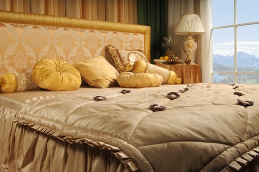 luxurious bed in a number with a kind on mountains