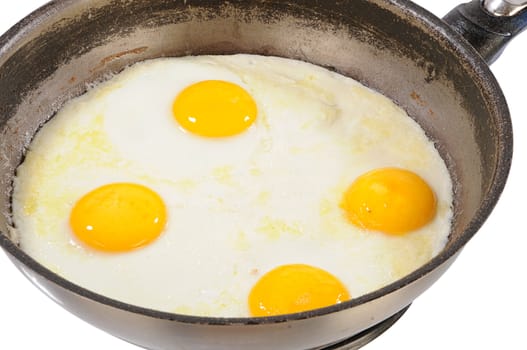 fried eggs from four eggs in a frying pan