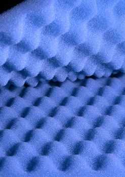 Two sheets of blue acoustic foam