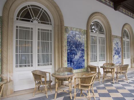 Buçaco palace entrance with tables to rest in the aftternoon 