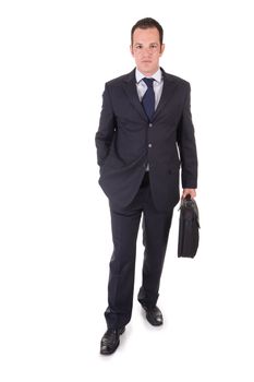 Handsome Young Businessman, standing with a suitcase. Isolated on white.