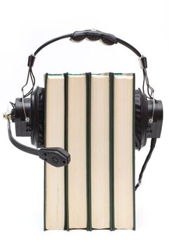 audiobook conception with headphones and books