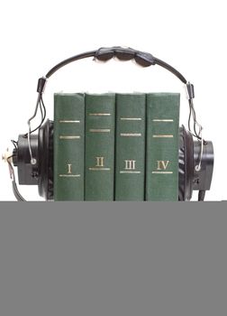 audiobook conception with headphones and books