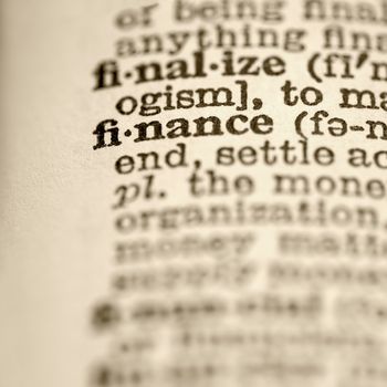 Selective focus of dictionary entry for the word finance.