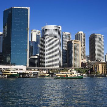 Downtown view of Sydney, Australia with boats in harbour.