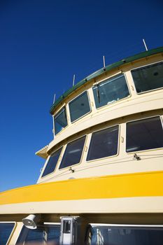 Detail of ferryboat showing windows and exterior in Sydney, Australia.