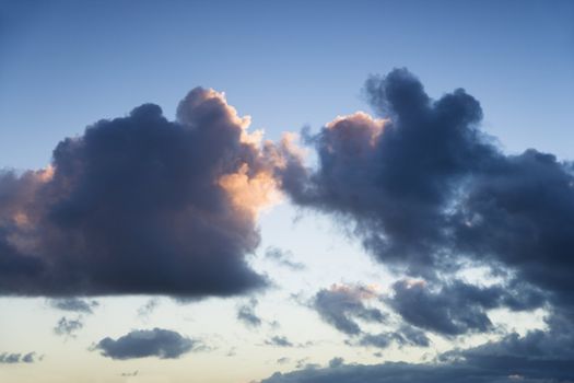 Colorful cumulus cloud formation in sky.