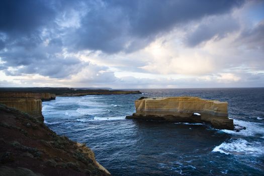 Land formation in ocean as seen from coast of Australia on the Great Ocean Road.