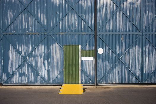 Exterior of building with door and metal siding, Australia.