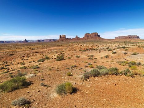 Scenic desert landforms in distance of landscape.