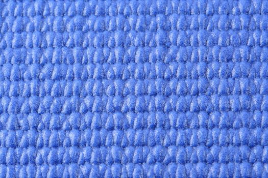 A Macro view of a blue yoga mat