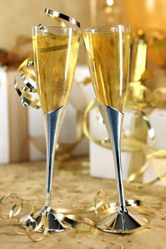 Golden Champagne Celebration With Bubbly and Gifts