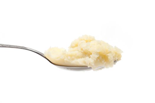 Spoon with mashed potatoes insulated on white background