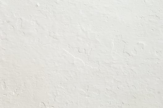 Detail of a rugged white wall suitable as background