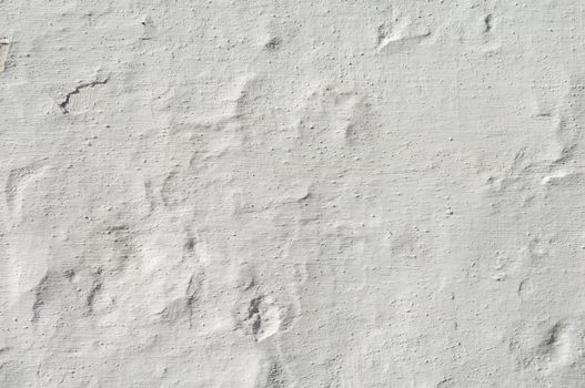 Detail of a rugged white wall suitable as background