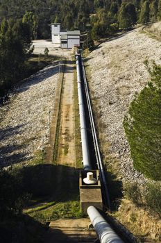 Water lift station and pipework near a dam 